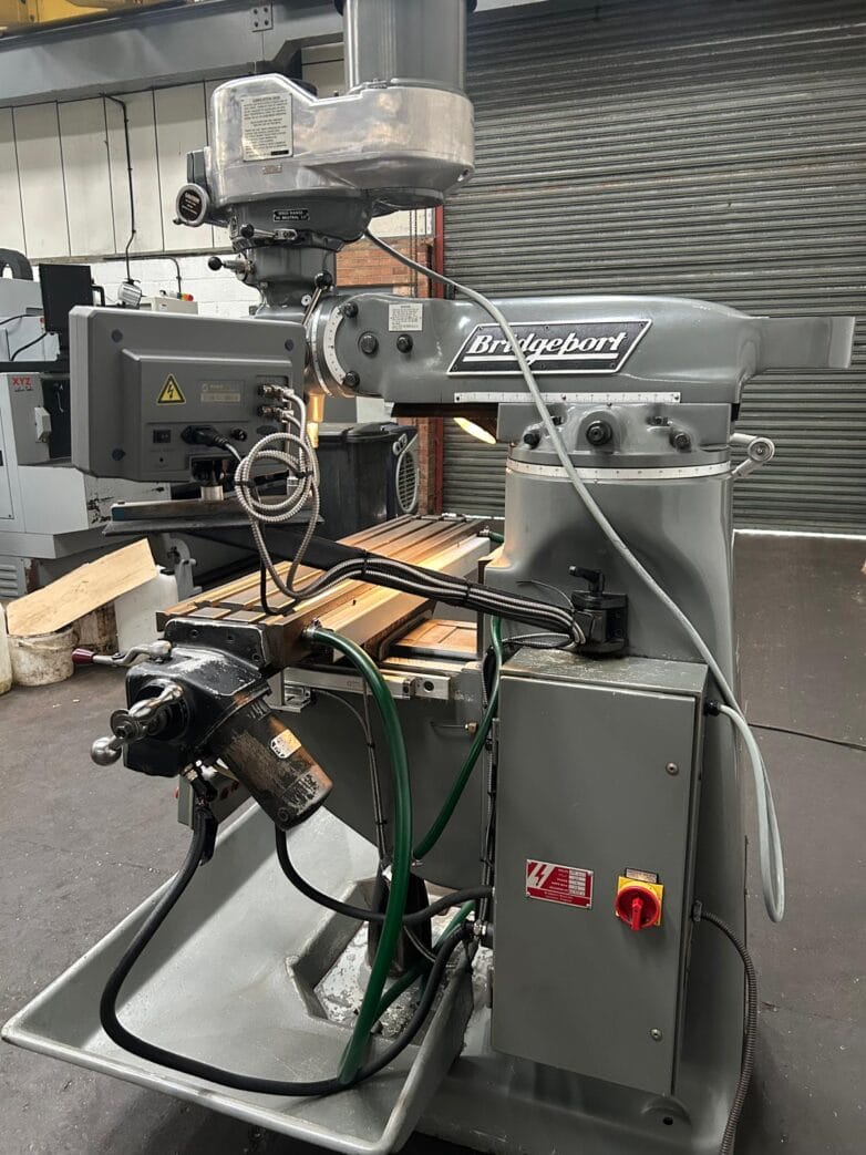 Bridgeport milling machine side view with worktable