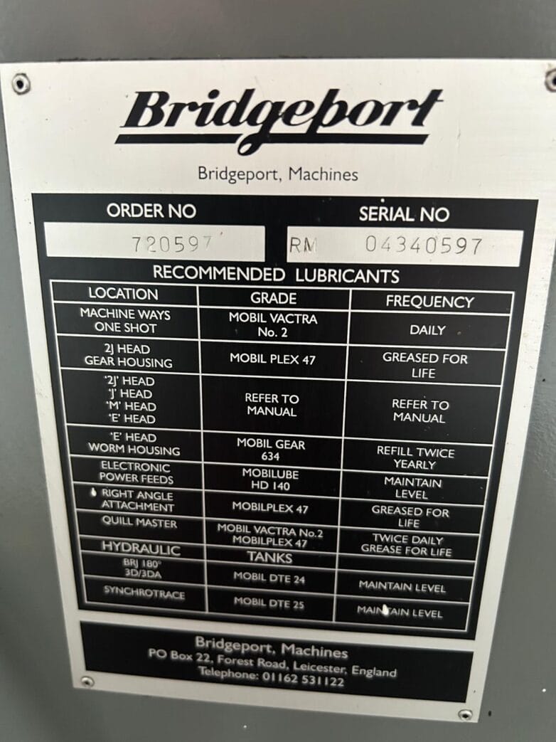 Bridgeport machine identification plate with serial number 04340597 and recommended lubricant chart for milling machine maintenance