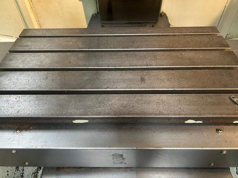 Close-up of the T-slot machine table on an XYZ 710 VMC vertical machining centre