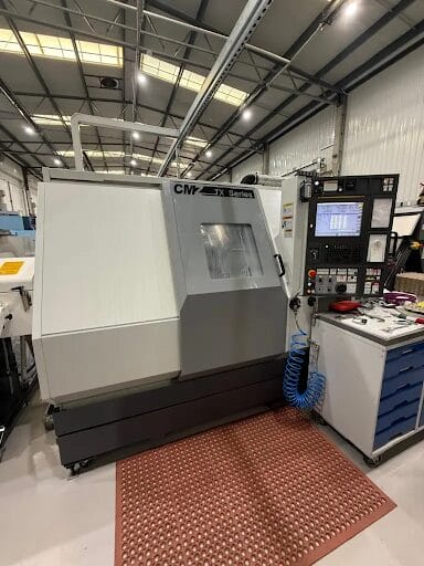 CNC turning machine in modern manufacturing workshop